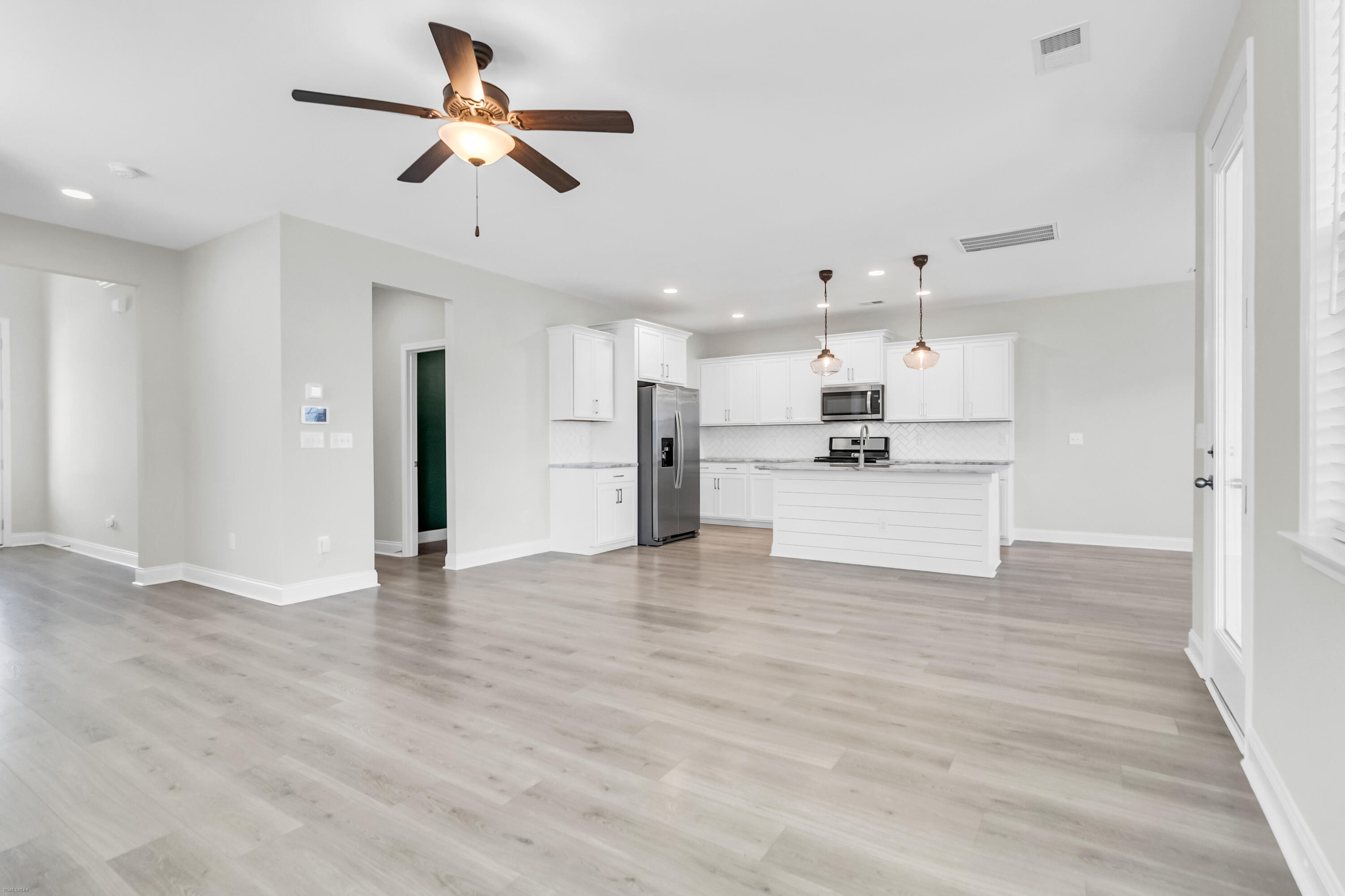 293 Red Leaf Boulevard Moncks Corner, SC 29461 - Photo 8 of 54 Great Room & Kitchen