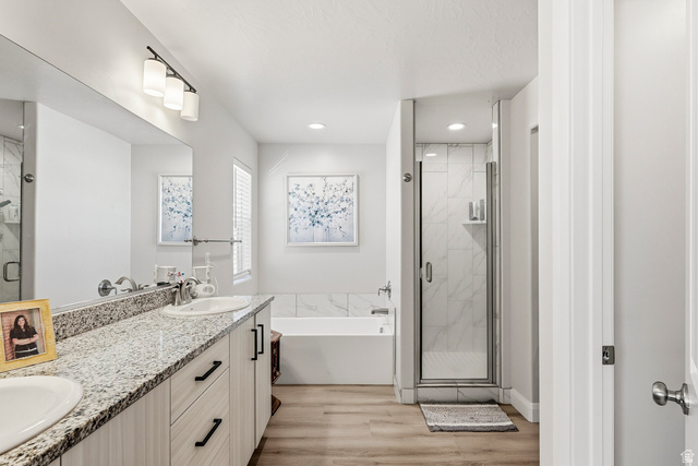 668 East Fiddlers Canyon Road, Unit 6 Cedar City, UT 84721 - Photo 17 of 36 Bathroom featuring a dual vanity with a granite countertop, undermount sinks, and contemporary fixtures