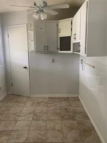 a view of a storage & utility room in a house