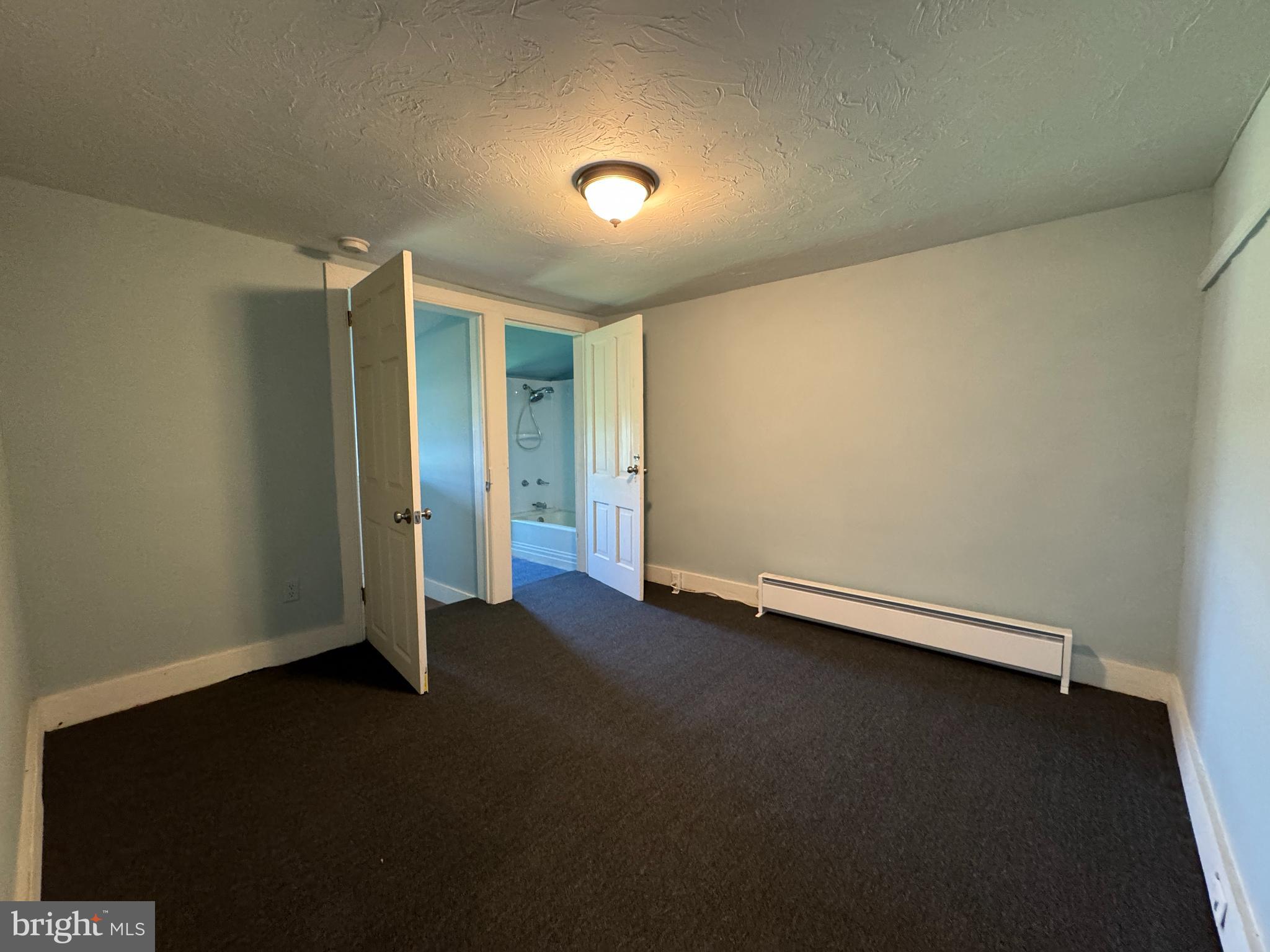 3754 Baltimore Pike, Unit 2 Littlestown, PA 17340 - Photo 13 of 24 an empty room with a door