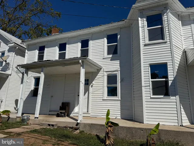 a view of a house with a patio