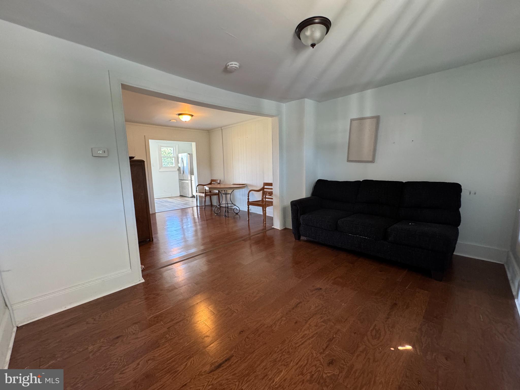 3754 Baltimore Pike, Unit 2 Littlestown, PA 17340 - Photo 6 of 24 a living room with furniture and a wooden floor
