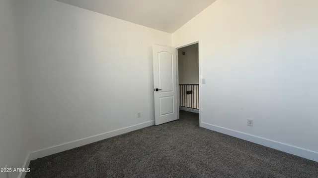 wooden floor and cabinet in an empty room