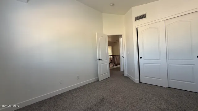 an empty room with closet