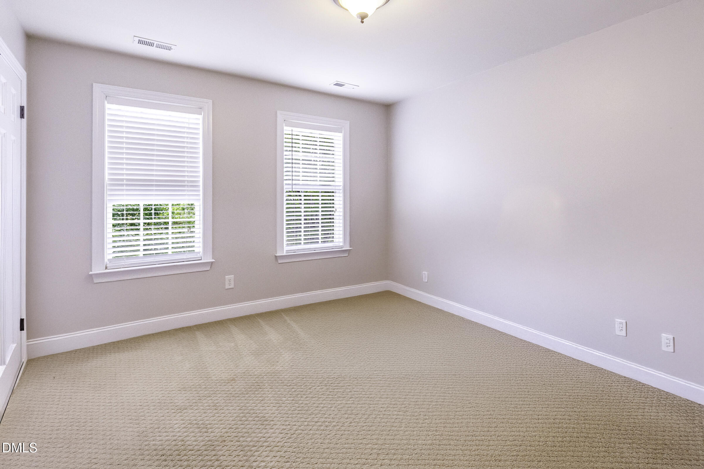 201 Quarryrock Road Holly Springs, NC 27540 - Photo 17 of 34 an empty room with a window