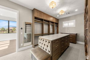 1141 East Lost Ridge Drive Washington, UT 84780 - Photo 75 of 108 Custom built-in wood cabinetry and shelving define this organized closet space