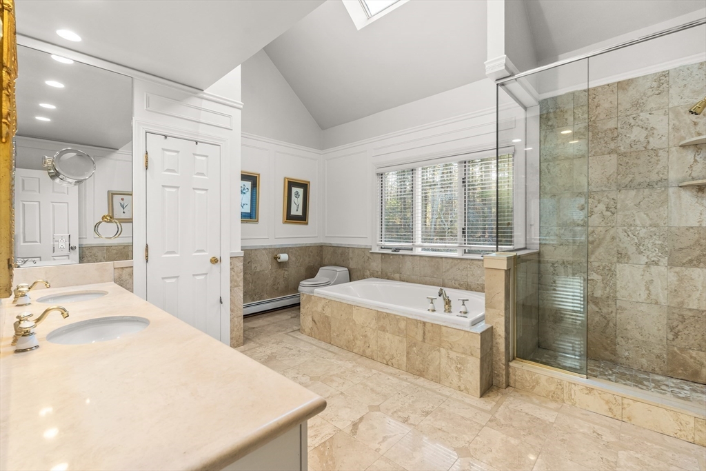 20 Burr Drive Needham, MA 02492 - Photo 13 of 19 a spacious bathroom with a tub sink and mirror