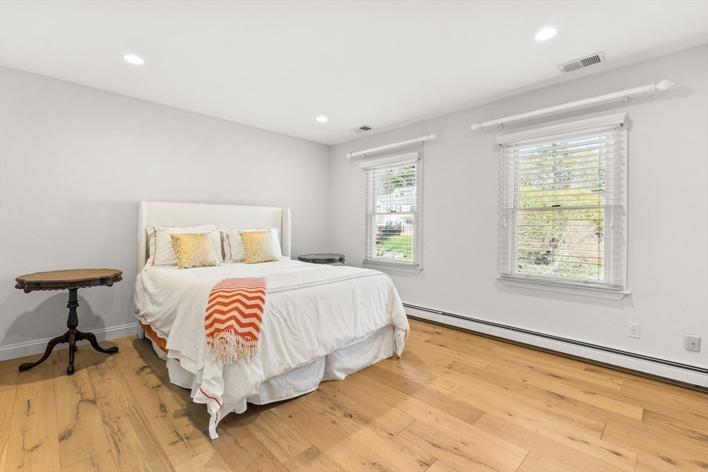 20 Burr Drive Needham, MA 02492 - Photo 14 of 19 a bedroom with a bed and a window