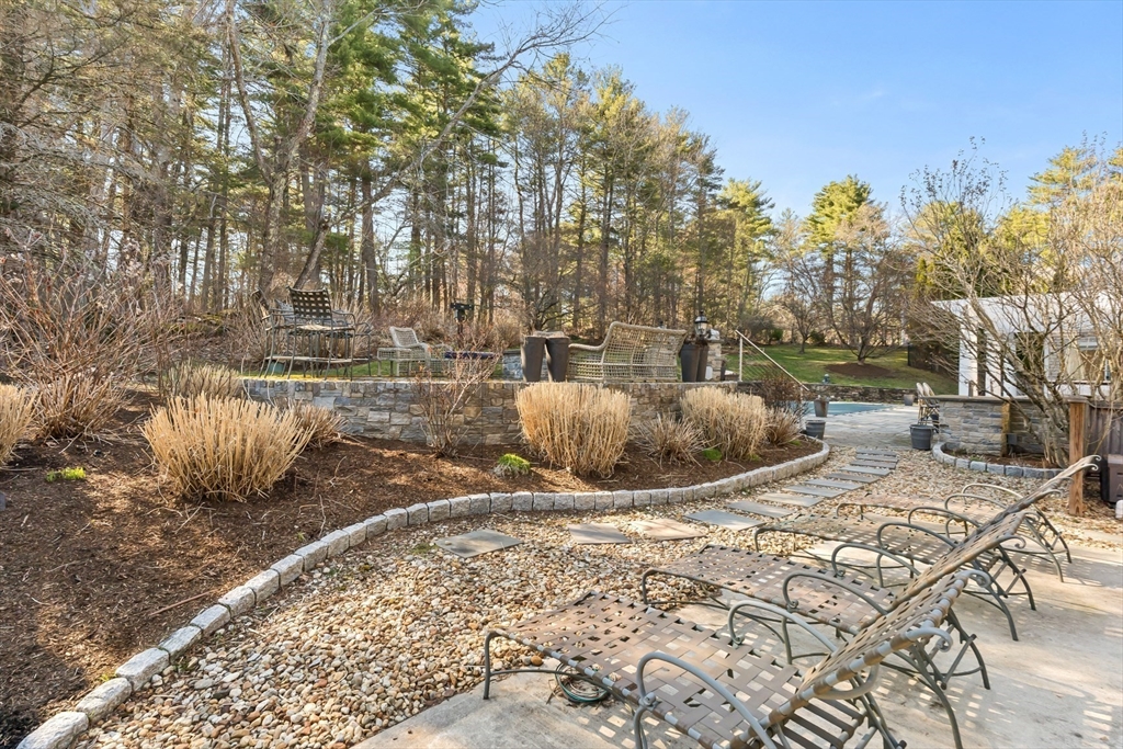20 Burr Drive Needham, MA 02492 - Photo 16 of 19 a view of a backyard of white house