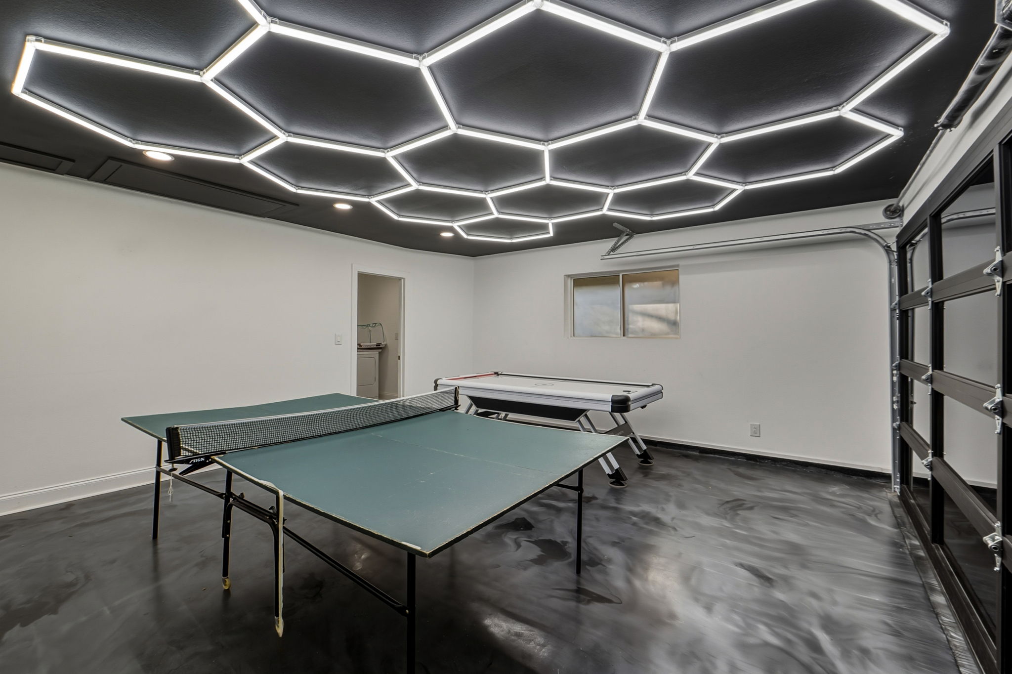 2107 Lewood Circle Austin, TX 78745 - Photo 18 of 30 Recreation room with concrete flooring