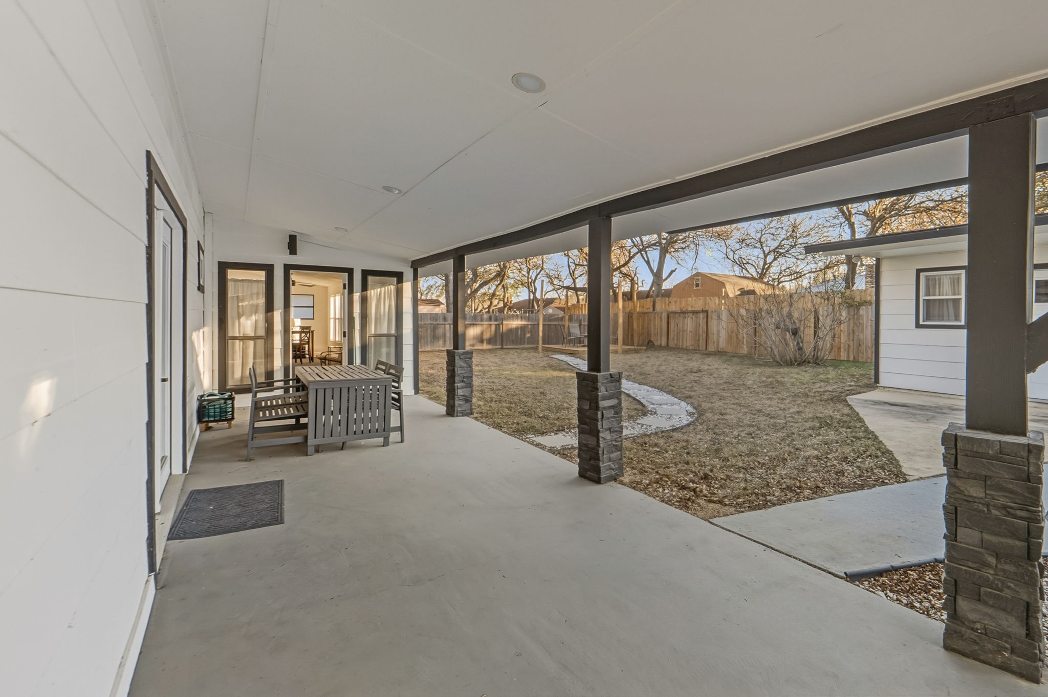2107 Lewood Circle Austin, TX 78745 - Photo 24 of 30 Fenced backyard featuring a patio area