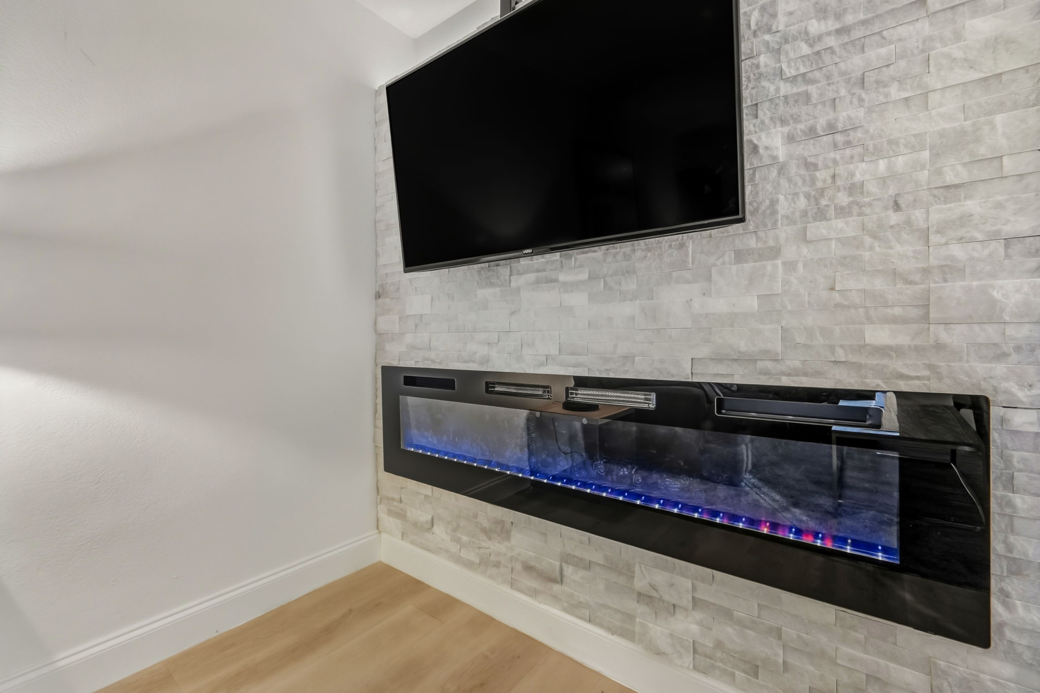 2107 Lewood Circle Austin, TX 78745 - Photo 7 of 30 Detailed view of baseboards and wood finished floors