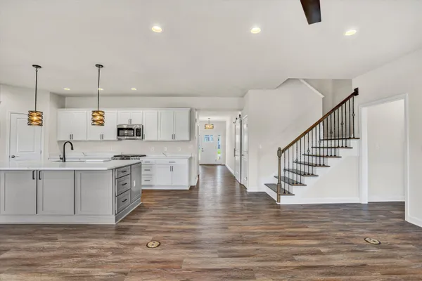 a view of kitchen and sink
