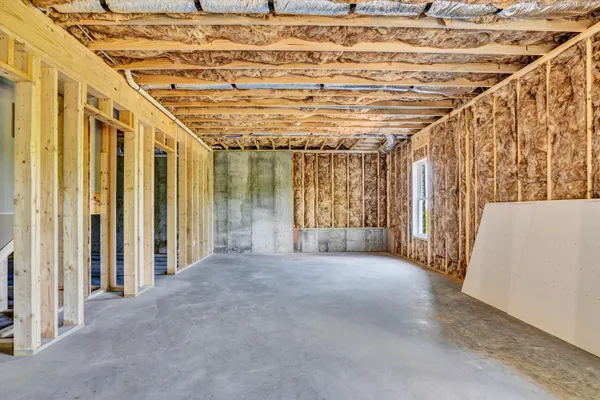 a view of a hallway with a wooden floors