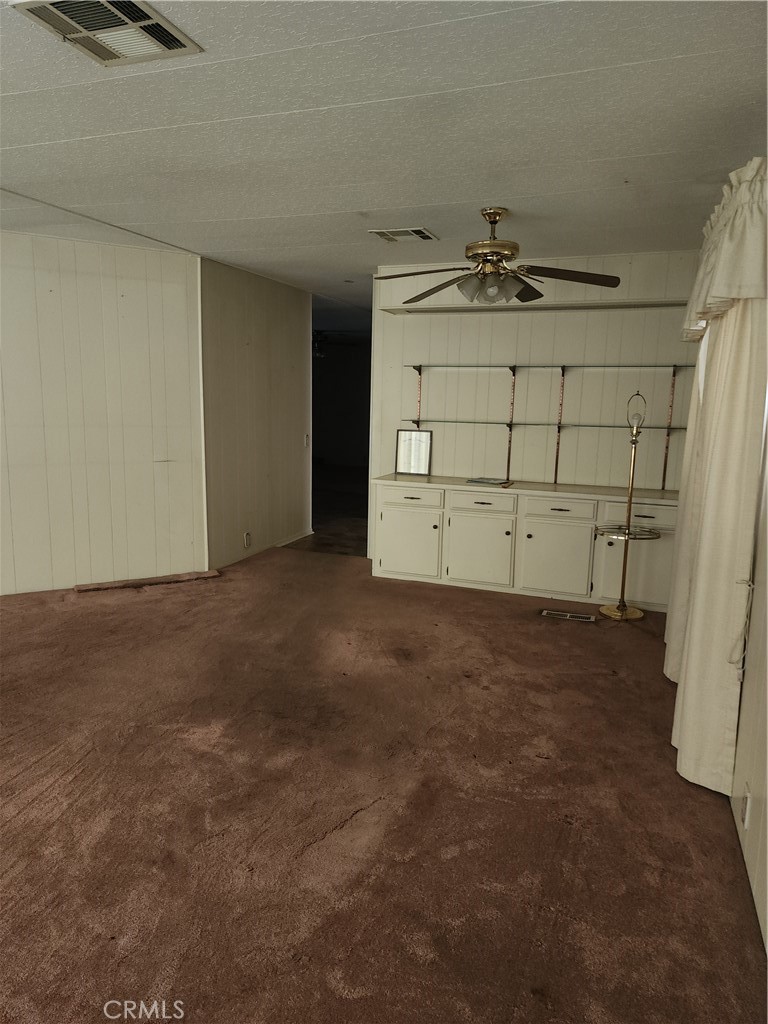 13393 Mariposa Road, Unit 181 Victorville, CA 92395 - Photo 13 of 19 a view of a garage