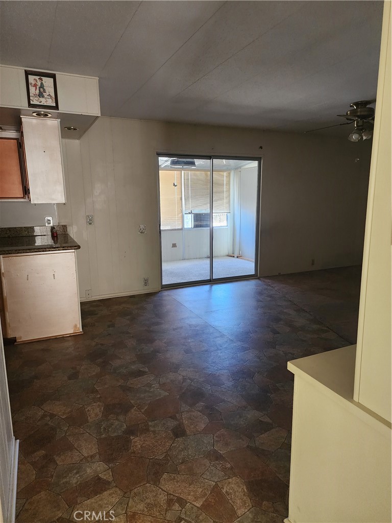 13393 Mariposa Road, Unit 181 Victorville, CA 92395 - Photo 14 of 19 a view of a kitchen with a sink and dishwasher