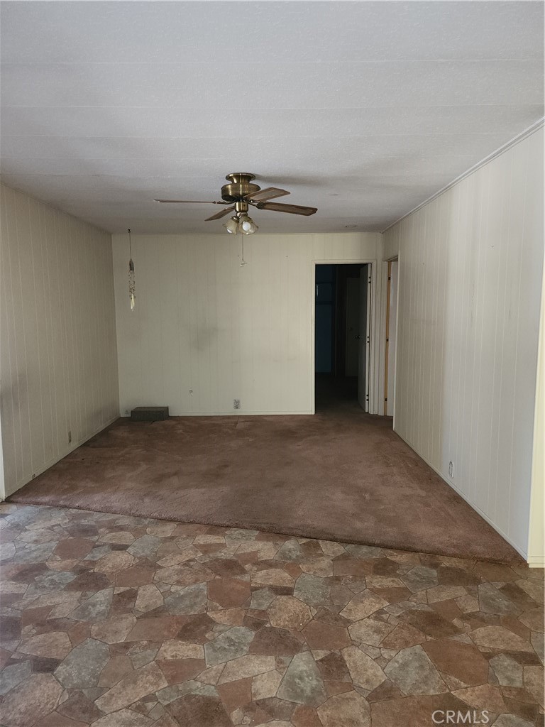 13393 Mariposa Road, Unit 181 Victorville, CA 92395 - Photo 16 of 19 a view of a garage