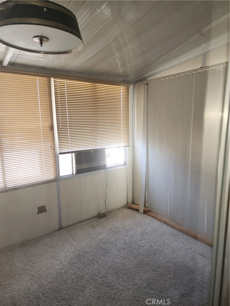 13393 Mariposa Road, Unit 181 Victorville, CA 92395 - Photo 8 of 19 a view of empty room with window