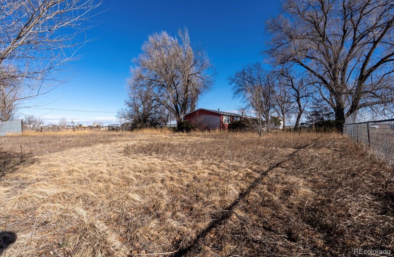 12169 East Baseline Road Lafayette, CO 80026 - Photo 26 of 32 a view of large outdoor space with trees