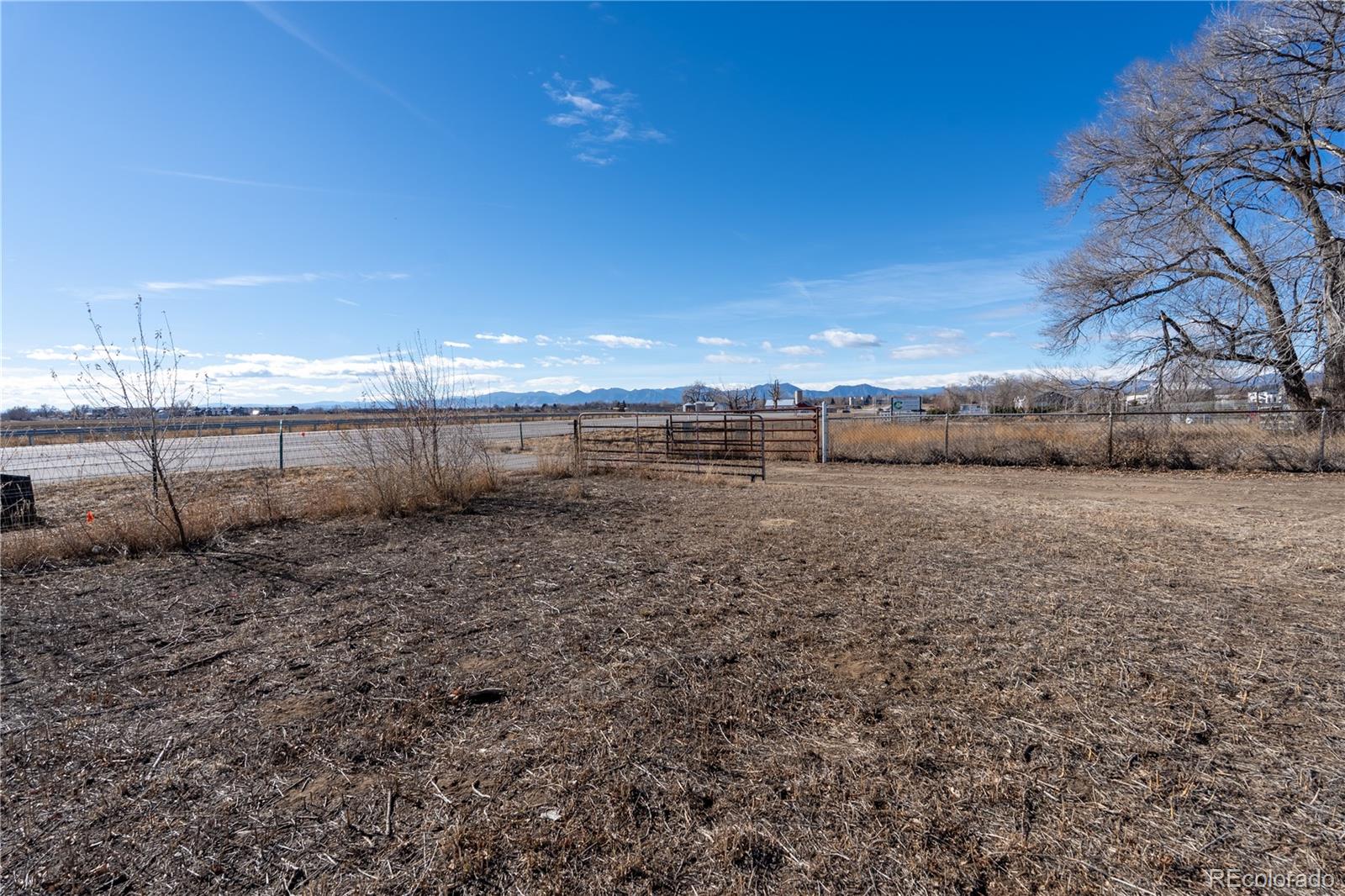 12169 East Baseline Road Lafayette, CO 80026 - Photo 31 of 32 a view of a dry yard with wooden fence