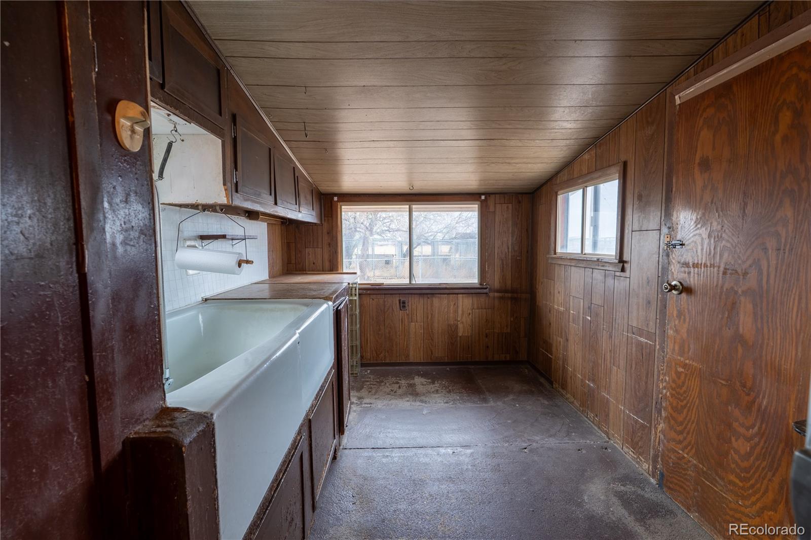 12169 East Baseline Road Lafayette, CO 80026 - Photo 4 of 32 a kitchen with counter top space and appliances