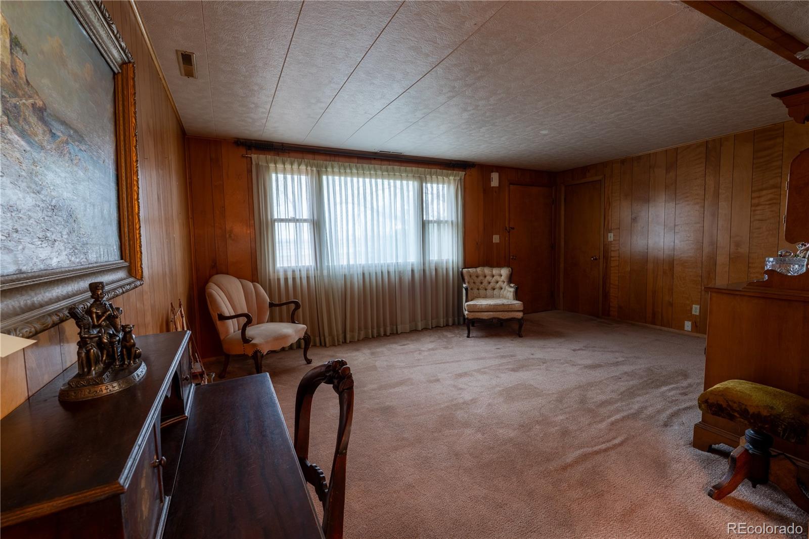 12169 East Baseline Road Lafayette, CO 80026 - Photo 5 of 32 a view of a room with gym equipment