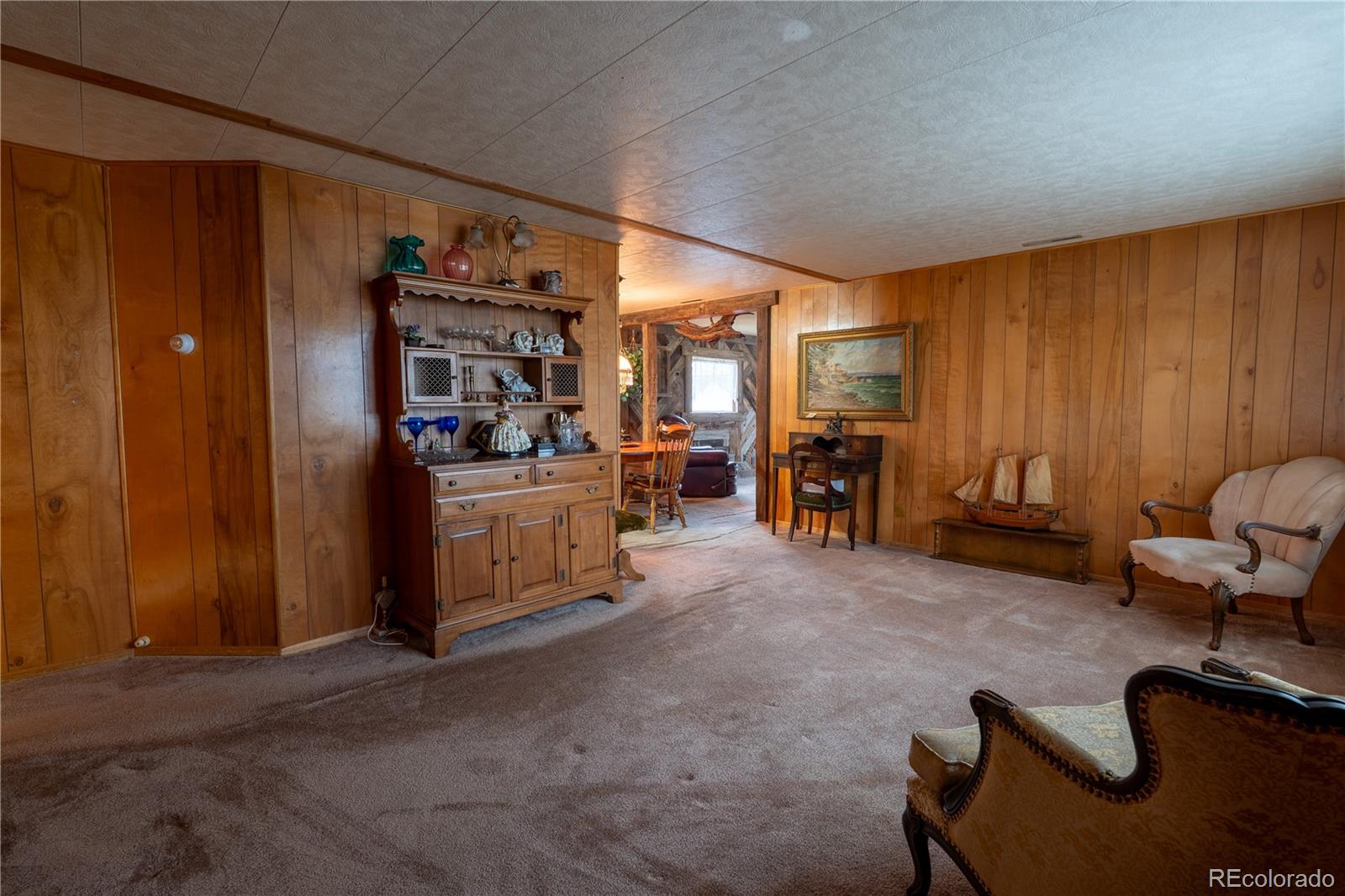 12169 East Baseline Road Lafayette, CO 80026 - Photo 6 of 32 a view of a livingroom with furniture and a furniture