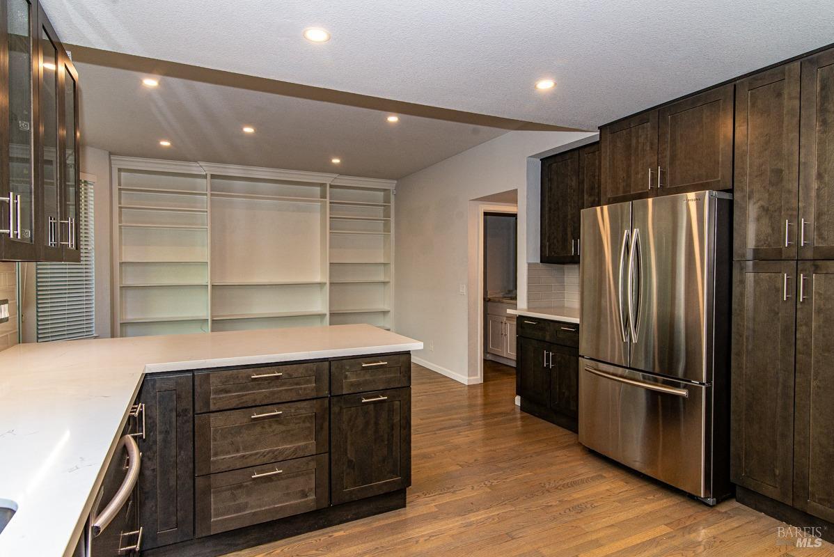 23 Baypoint Drive San Rafael, CA 94901 - Photo 12 of 40 a kitchen with a refrigerator and a sink