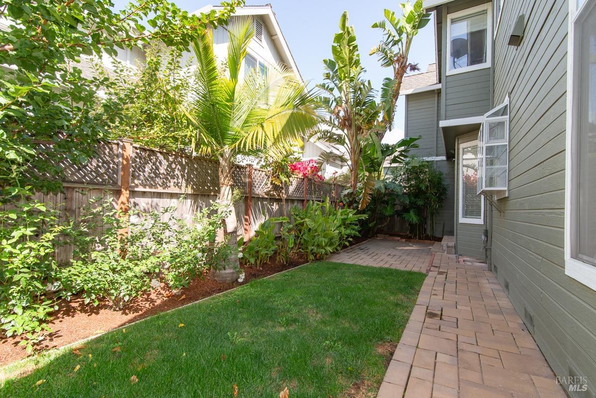 23 Baypoint Drive San Rafael, CA 94901 - Photo 30 of 40 a view of yellow house with a yard