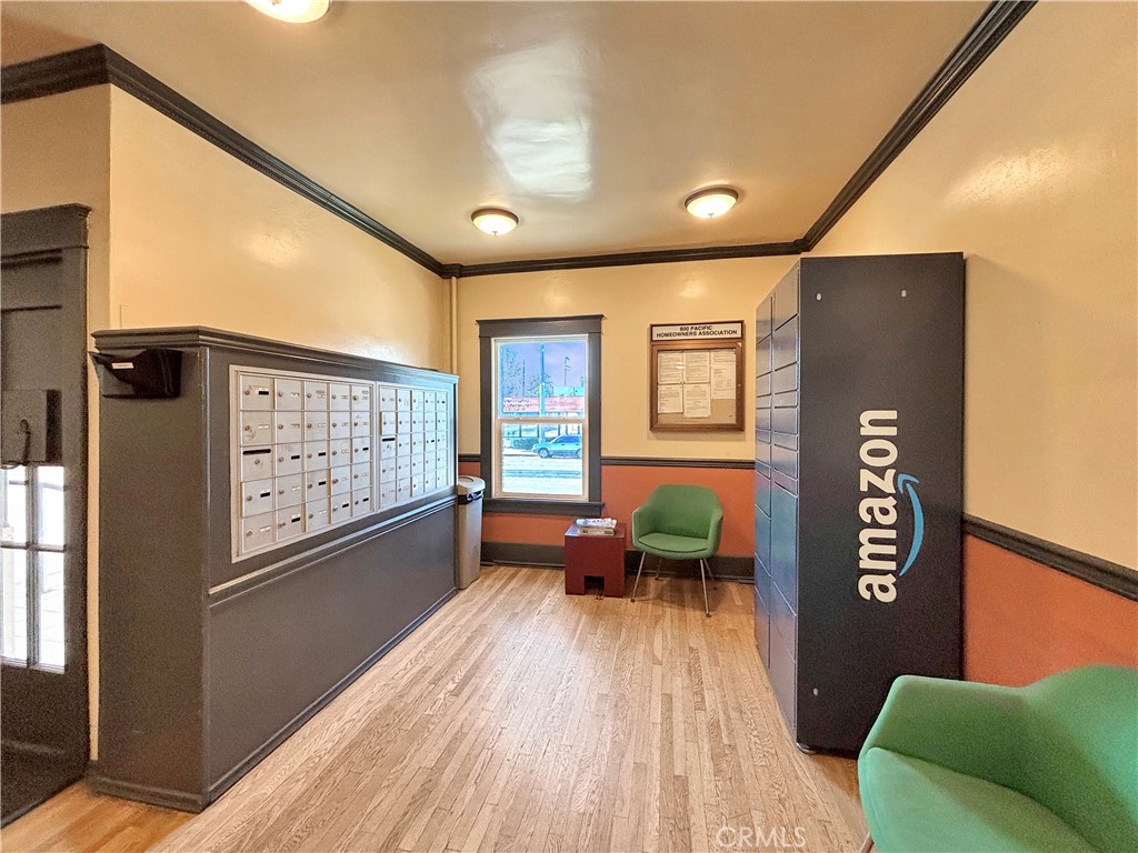 800 Pacific Avenue, Unit 300 Long Beach, CA 90813 - Photo 8 of 20 a living room with furniture and a large window