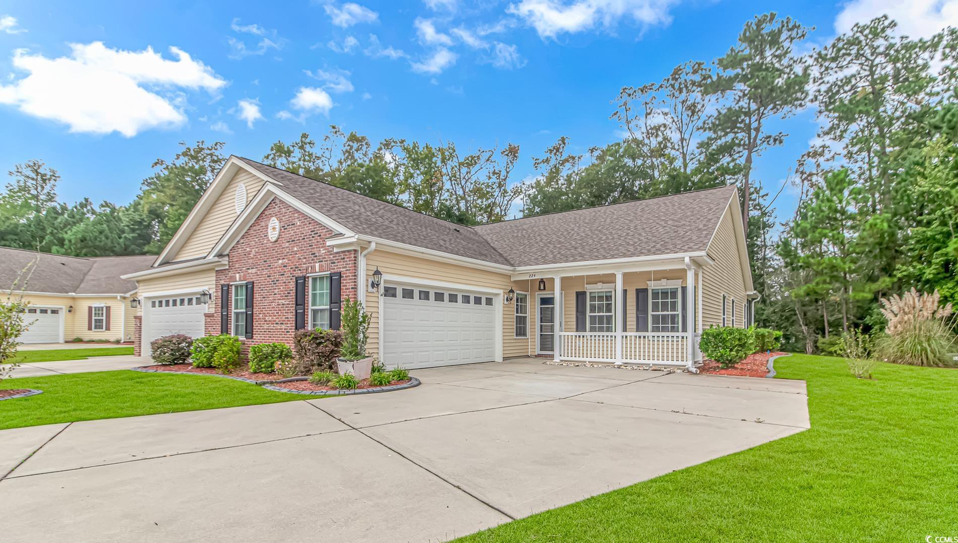 224 Rose Water Loop Myrtle Beach, SC 29588 - Photo 1 of 40 View of front of property with a front yard and a