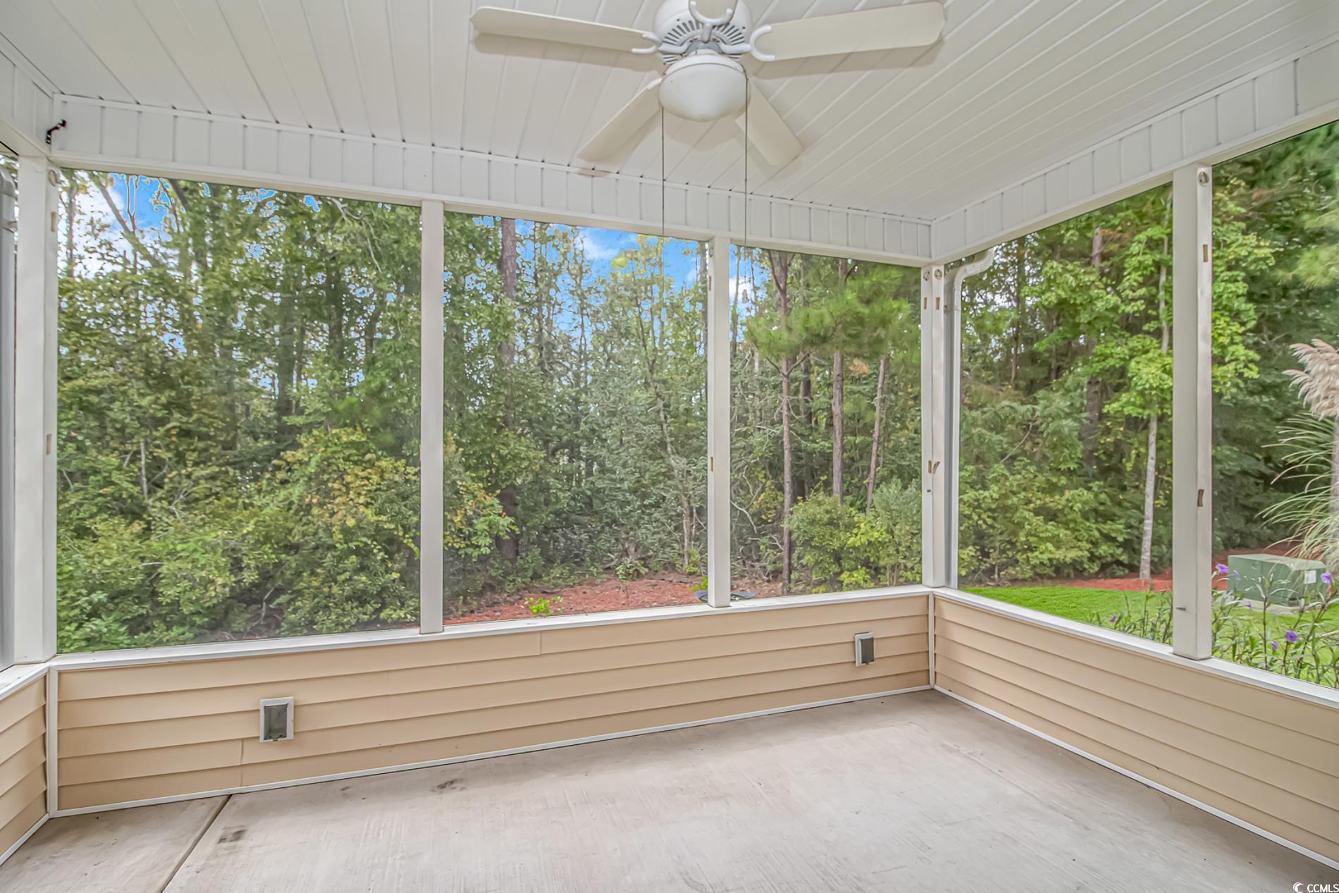 224 Rose Water Loop Myrtle Beach, SC 29588 - Photo 3 of 40 Unfurnished sunroom featuring ceiling fan