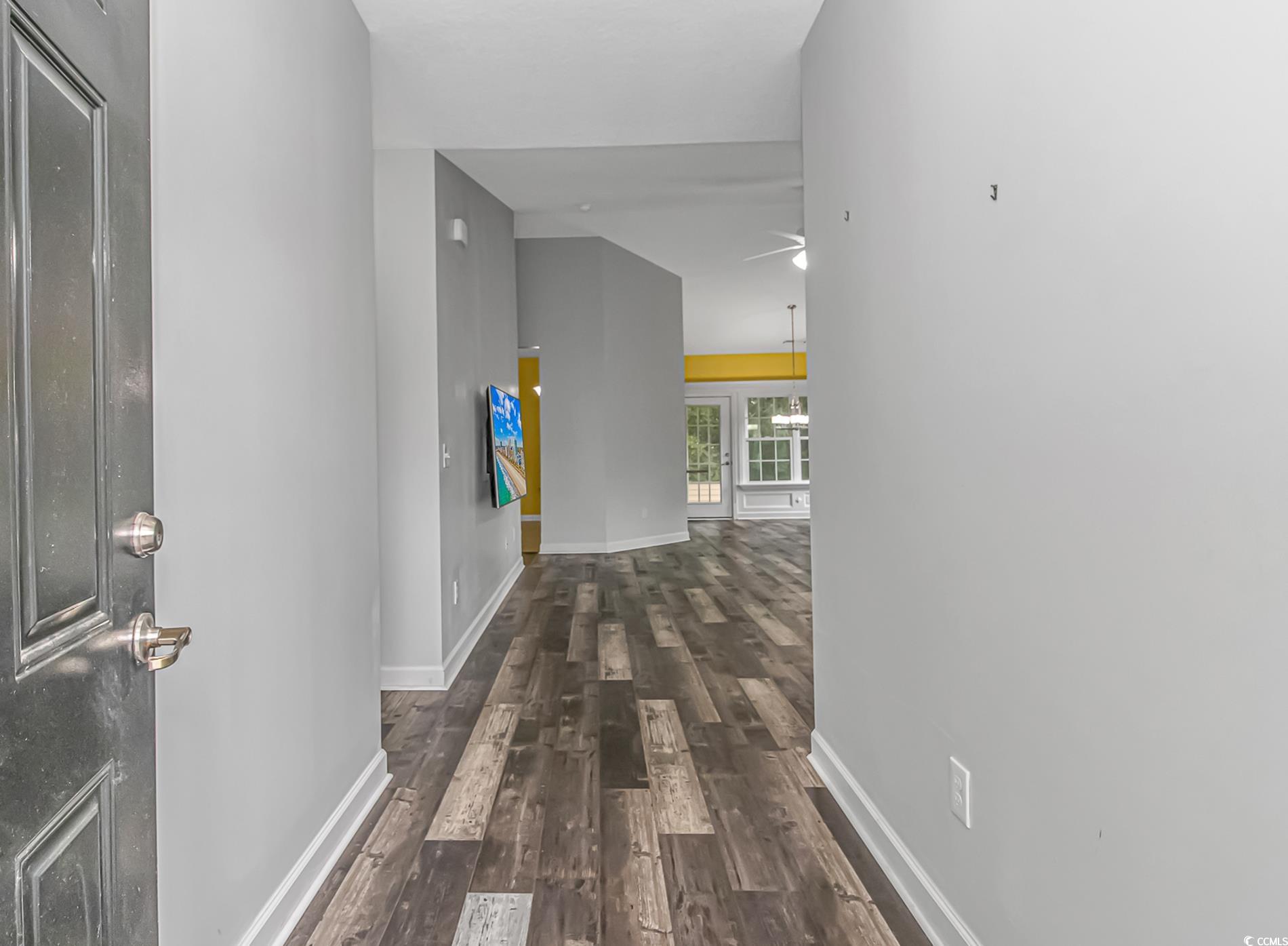 224 Rose Water Loop Myrtle Beach, SC 29588 - Photo 4 of 40 Corridor featuring lofted ceiling and dark wood-ty