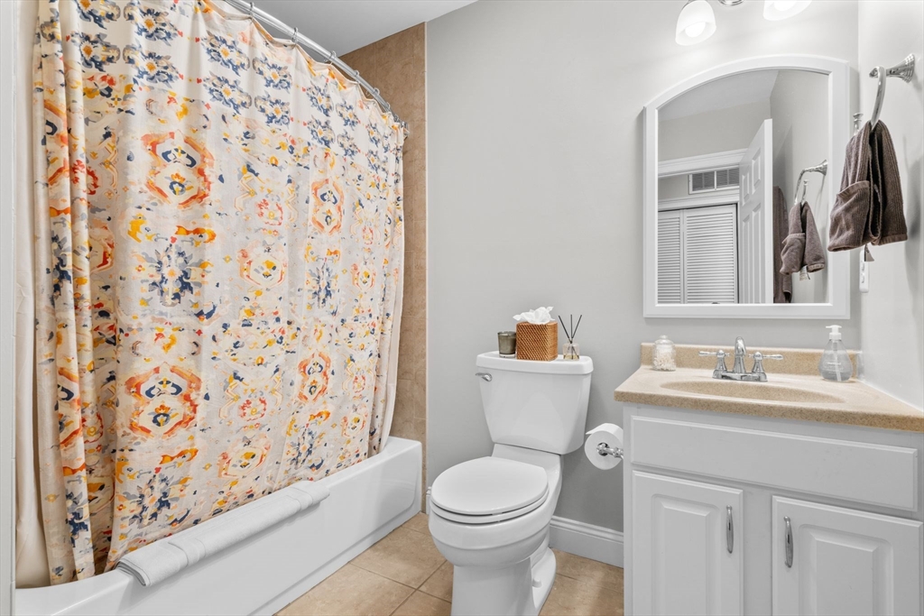 34 H Street, Unit 2L Boston, MA 02127 - Photo 10 of 20 a bathroom with a sink toilet and shower