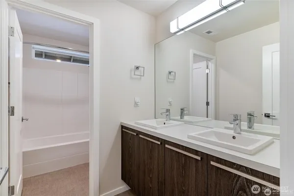 a bathroom with a shower and a toilet