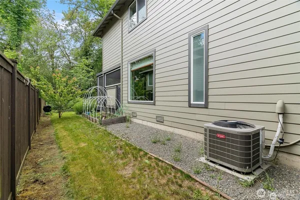 a backyard of a house with lots of green space