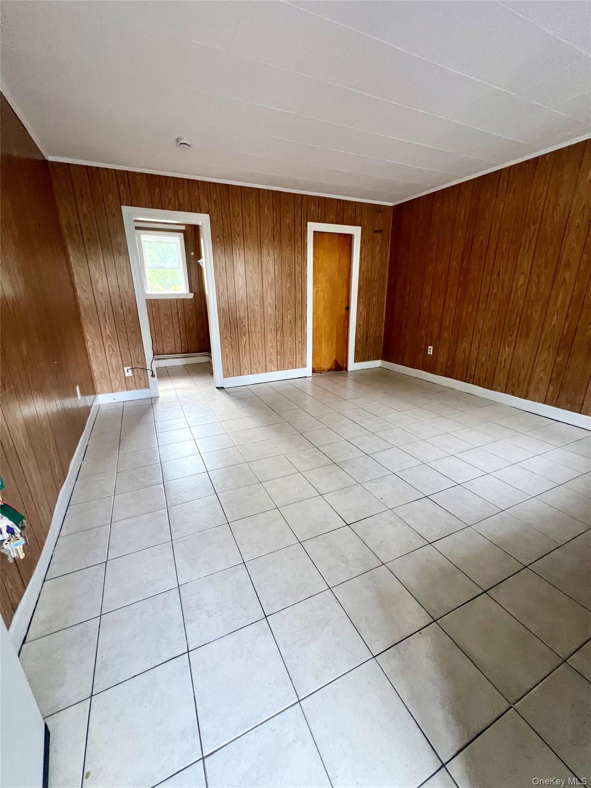 1612-1616 Rte 9W, Unit 18 Milton, NY 12547 - Photo 2 of 6 a view of an empty room and a window