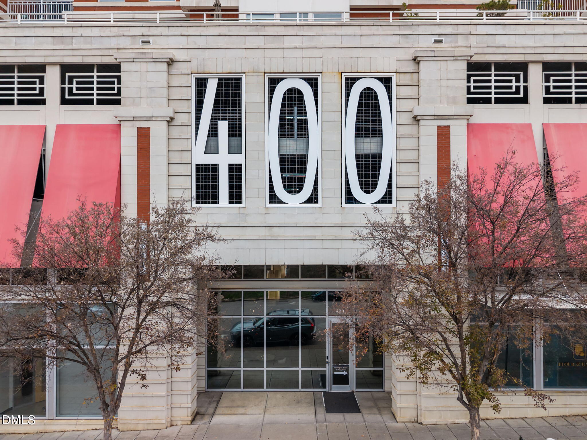a front view of a building with large windows