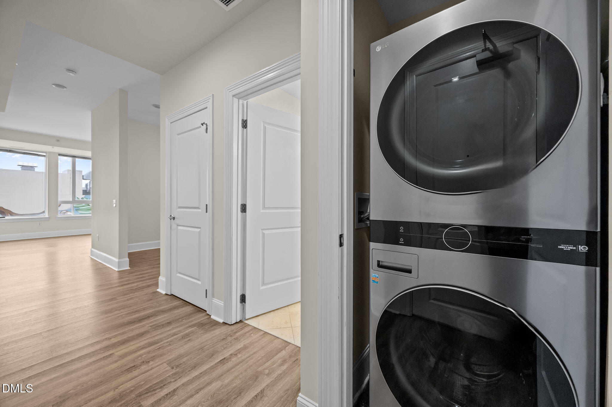 400 West North Street, Unit 814 Raleigh, NC 27603 - Photo 11 of 45 a view of a hallway with washer and dryer