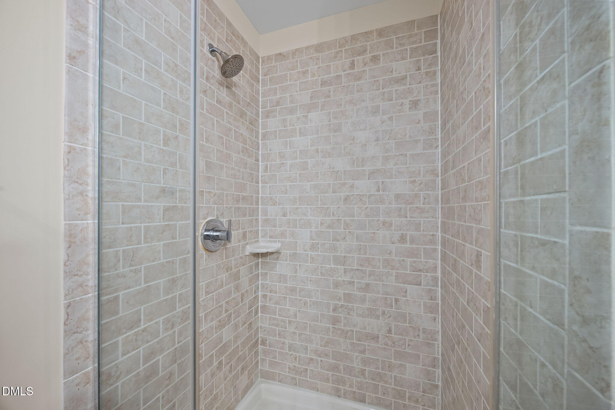 400 West North Street, Unit 814 Raleigh, NC 27603 - Photo 14 of 45 a bathroom with a shower