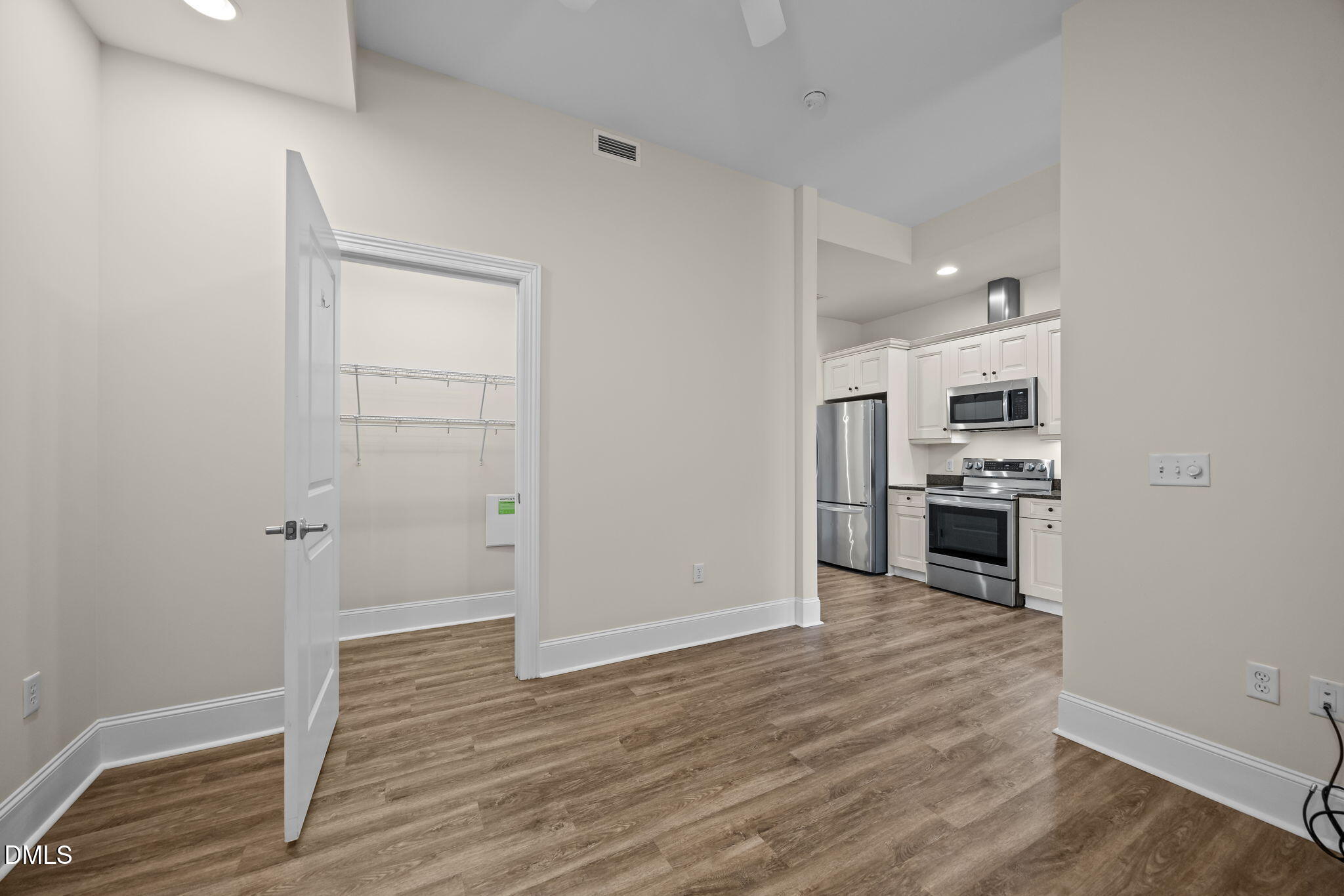 400 West North Street, Unit 814 Raleigh, NC 27603 - Photo 22 of 45 a view of kitchen and wooden floor