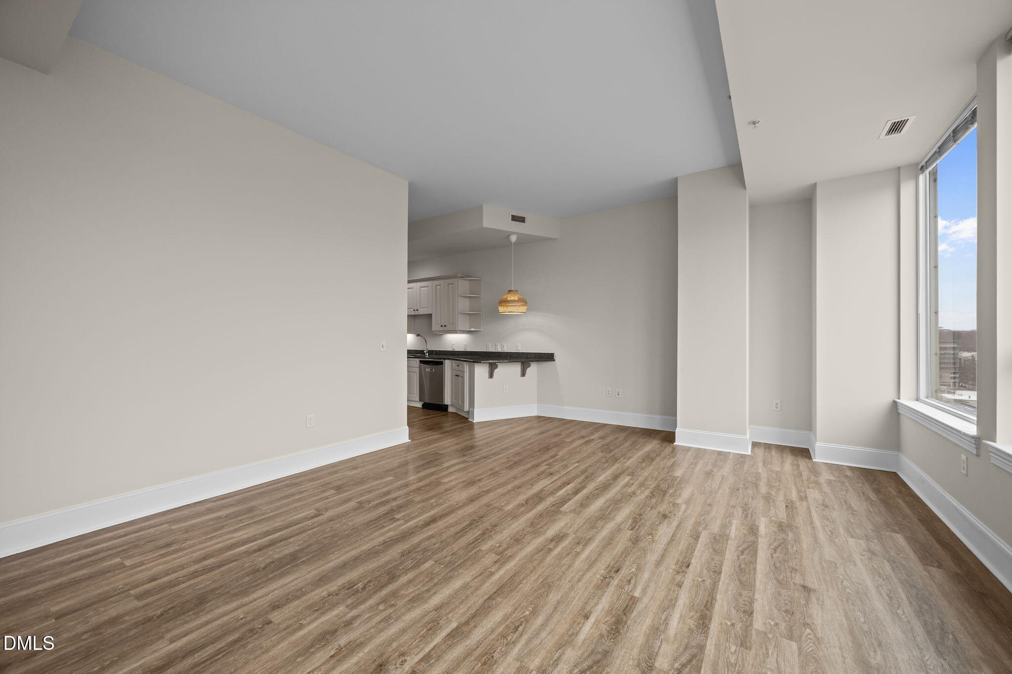 400 West North Street, Unit 814 Raleigh, NC 27603 - Photo 27 of 45 a view of empty room with wooden floor and fan