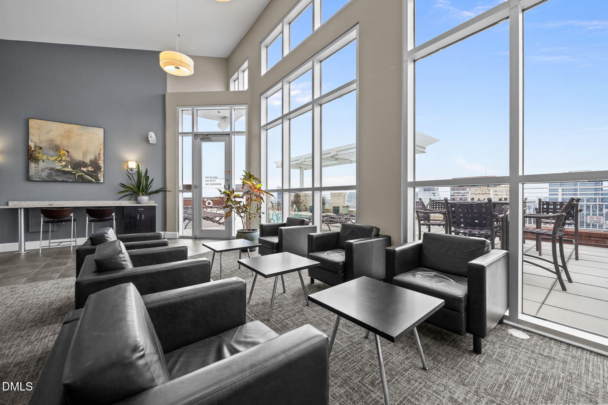 400 West North Street, Unit 814 Raleigh, NC 27603 - Photo 32 of 45 a living room with furniture and a large window