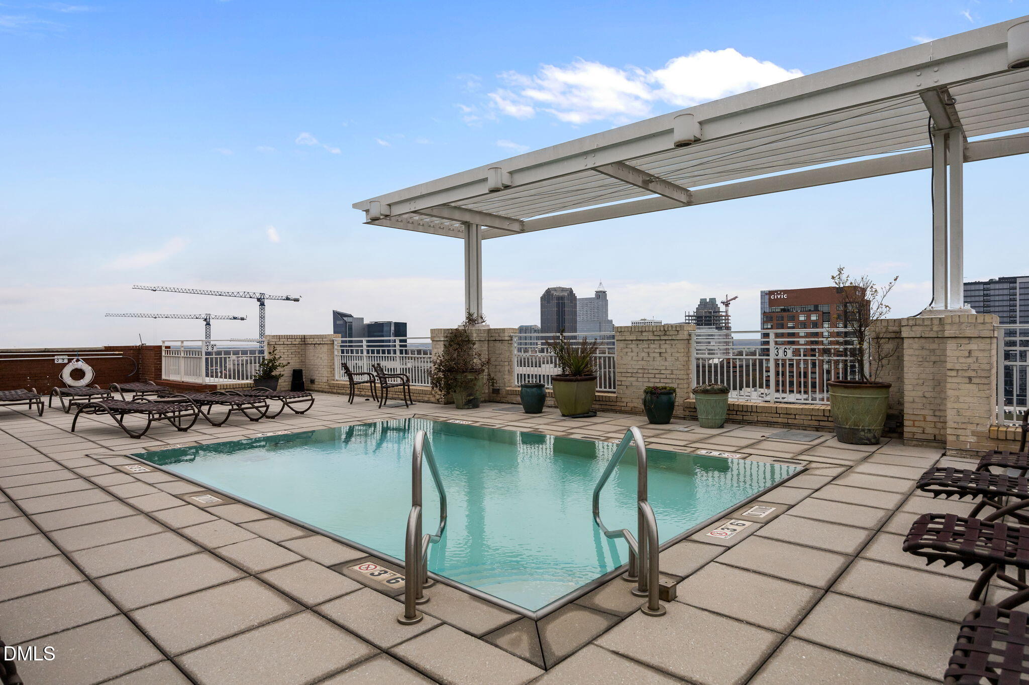 400 West North Street, Unit 814 Raleigh, NC 27603 - Photo 35 of 45 a view of a terrace with chairs