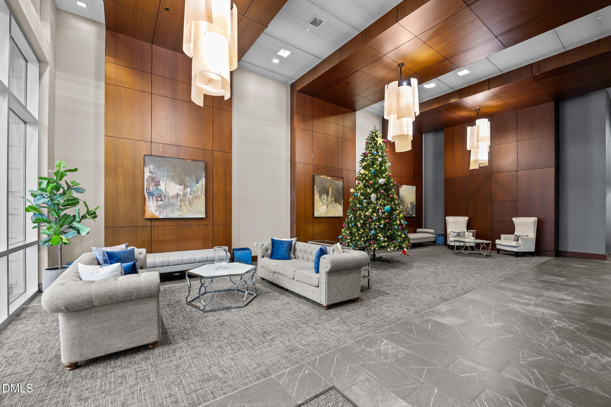 400 West North Street, Unit 814 Raleigh, NC 27603 - Photo 9 of 45 a living room with furniture and a potted plant