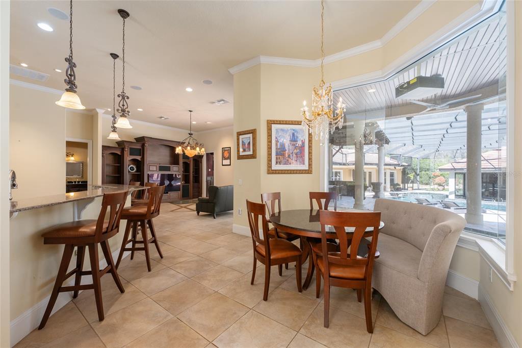695 Southeast 47th Loop Ocala, FL 34480 - Photo 12 of 79 a view of a dining area with furniture