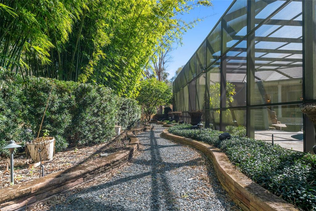 695 Southeast 47th Loop Ocala, FL 34480 - Photo 78 of 79 a view of a house with a yard and sitting area