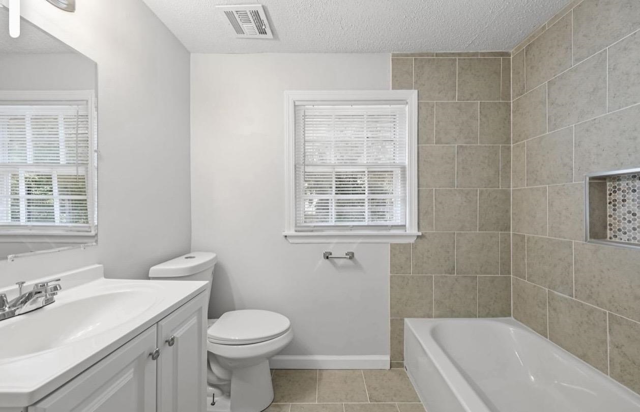 3843 Blue Jay Road Memphis, TN 38116 - Photo 18 of 23 a bathroom with a sink toilet and shower
