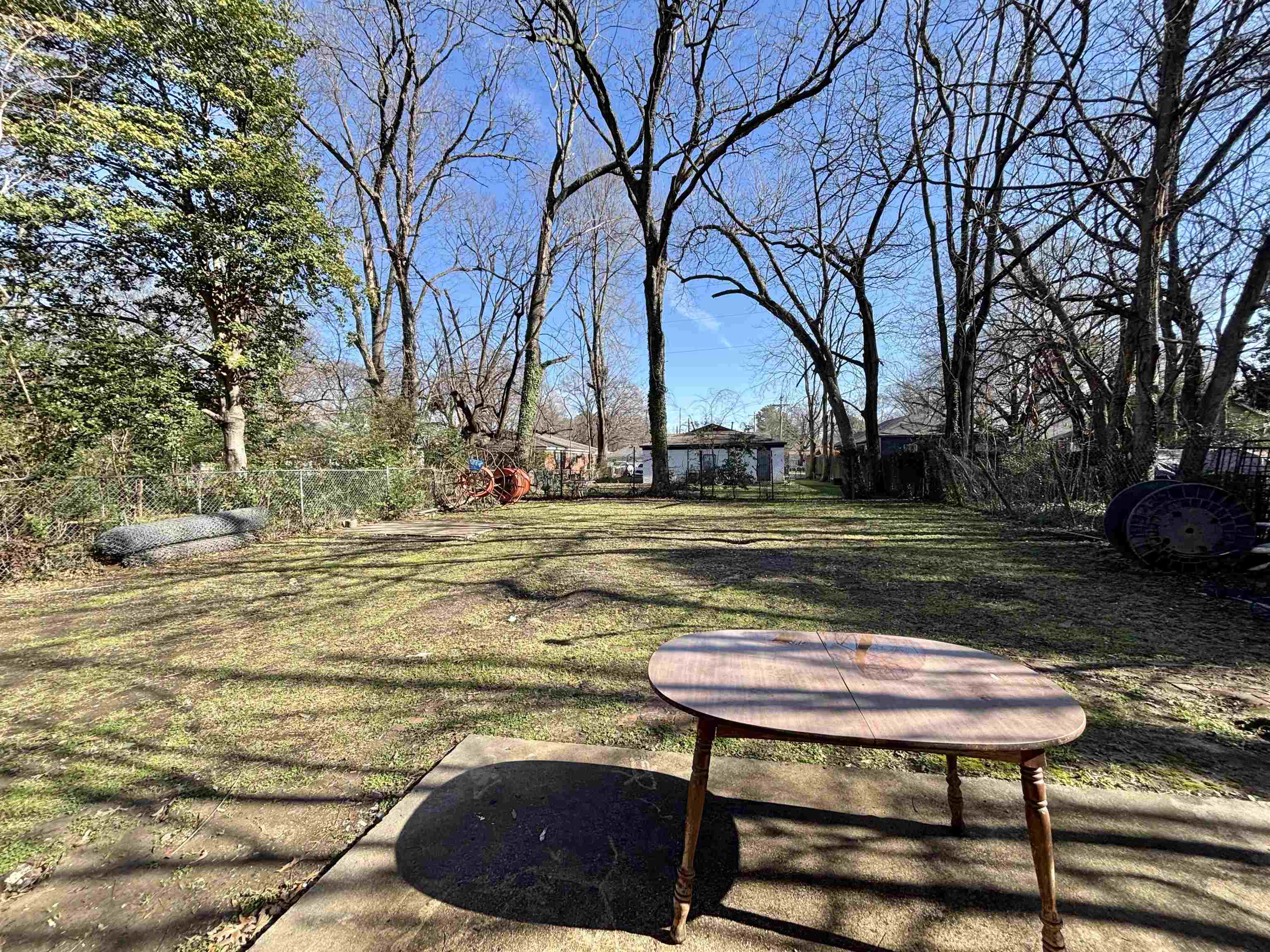 778 Atlantic Street Memphis, TN 38112 - Photo 15 of 15 a view of a swimming pool with a yard and furniture