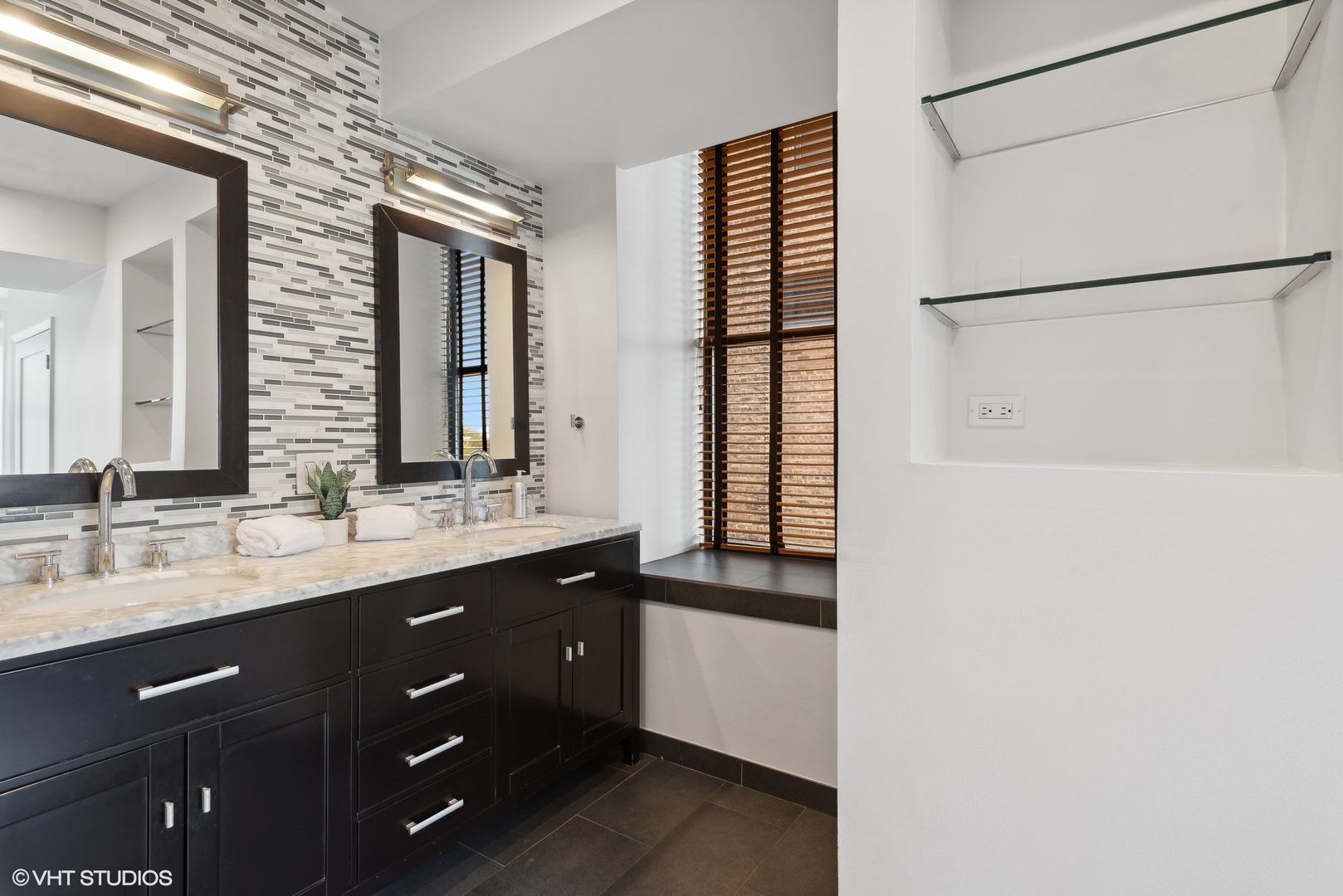 411 South Sangamon Street, Unit 2D Chicago, IL 60607 - Photo 12 of 18 a bathroom with a double vanity sink and mirror
